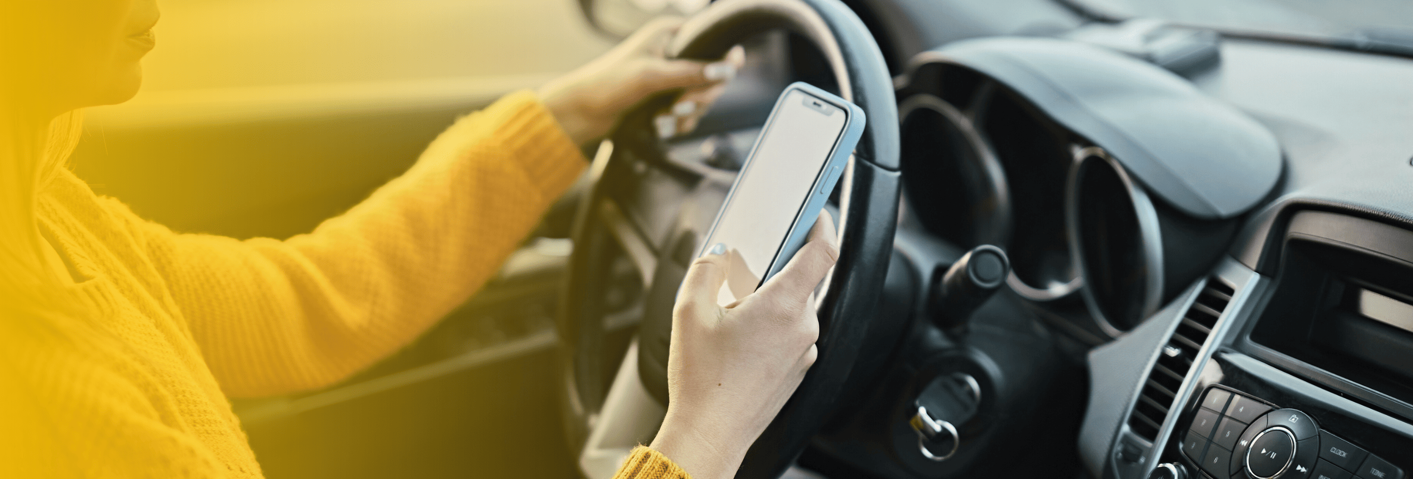 Distracted driver using a smartphone while operating a vehicle