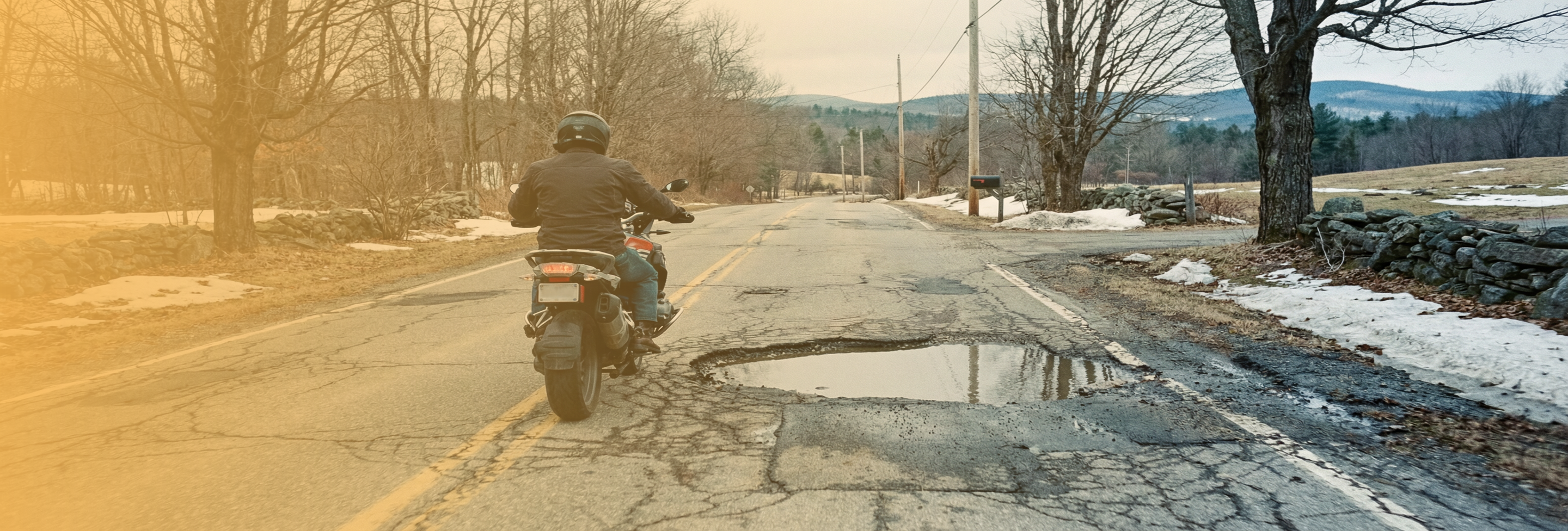 Can Road Hazards Like Potholes Cause a Motorcycle Accident Claim in NH?